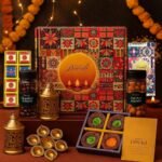 Fruitri festive Diwali hamper with urli, two lanterns, clay diyas, makhana and chocolates